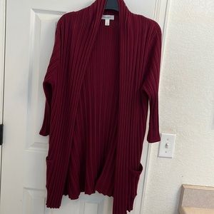 Burgundy cardigan with 3/4 sleeves and pockets.